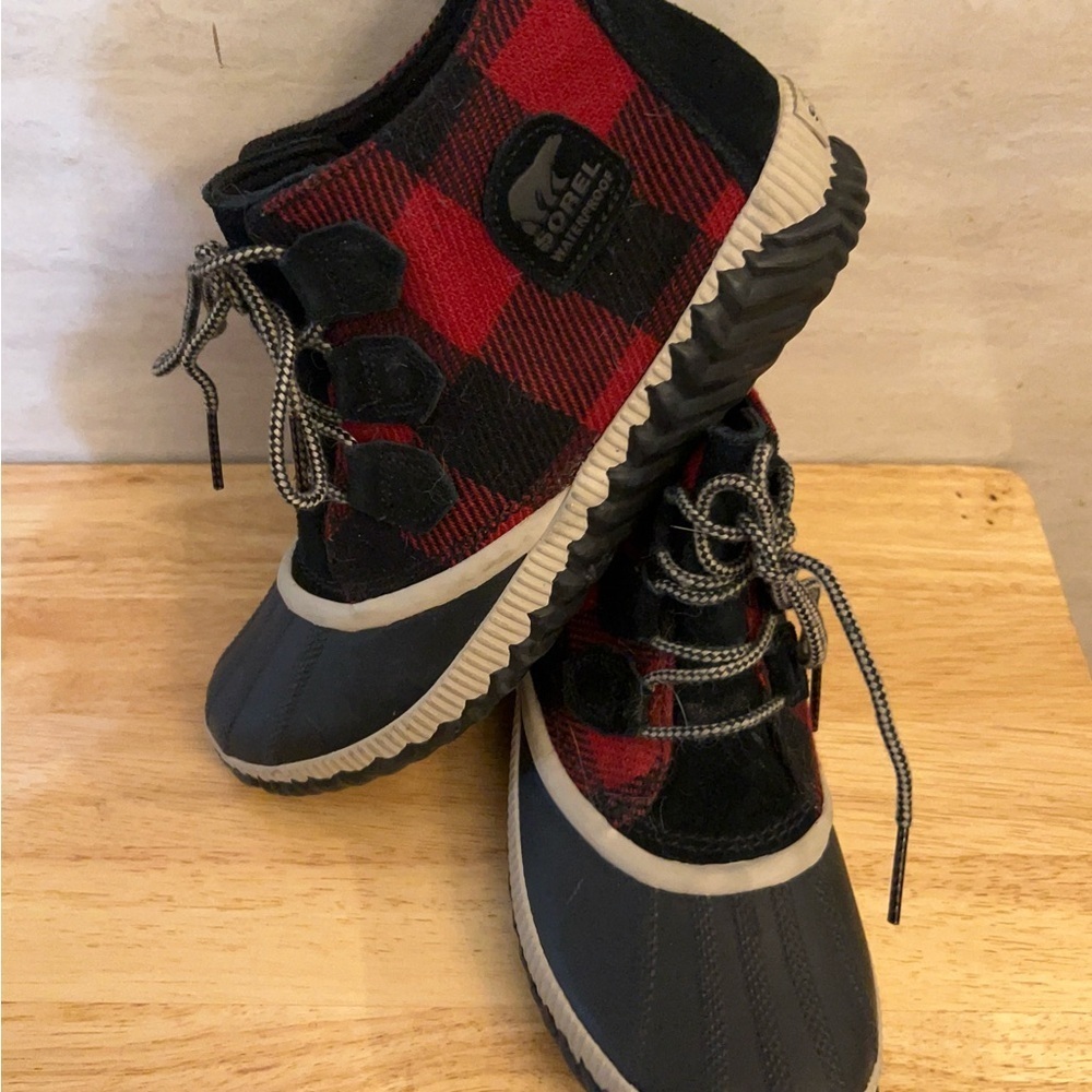 Sorel Out 'N About Plus duck boots in a red and black buffalo plaid pattern. - Picture 5 of 10